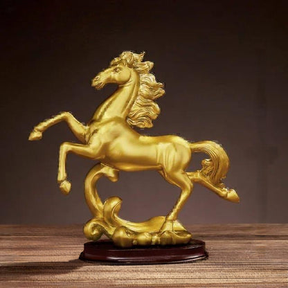 Gold decorative horse sculpture available in two elegant designs.