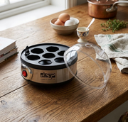 350W electric egg boiler with steam rack and 7 Egg capacity for quick and easy cooking