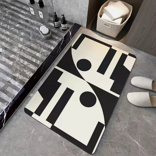 Absorbent black and white floral bathroom mat with rubber bottom and non-slip waterproof design