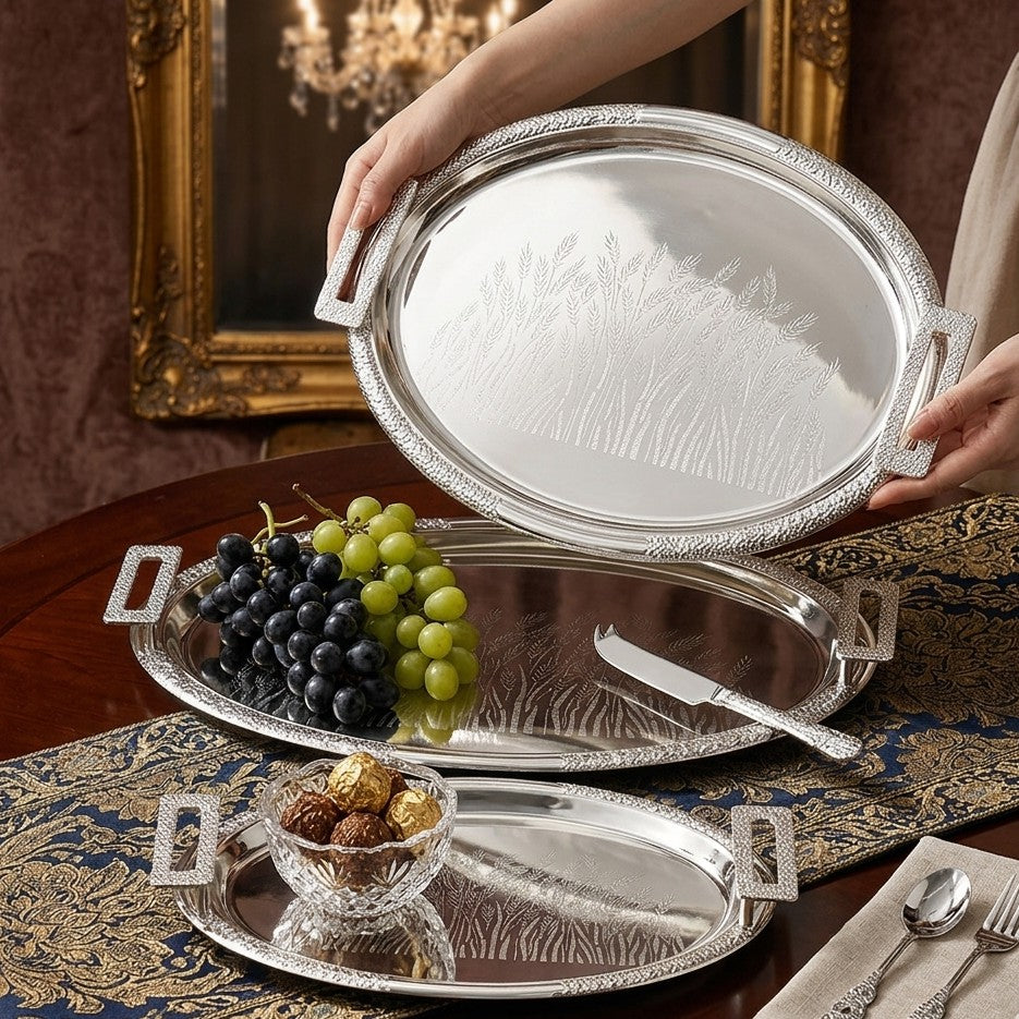 Three piece antique silver double tone mirror polished metal tray set in 40 cm, 35 cm, and 30 cm sizes.