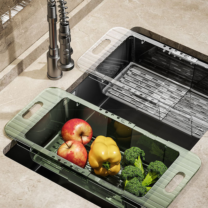 Extendable acrylic over-the-sink colander for rinsing, draining, and storing kitchen essentials

 