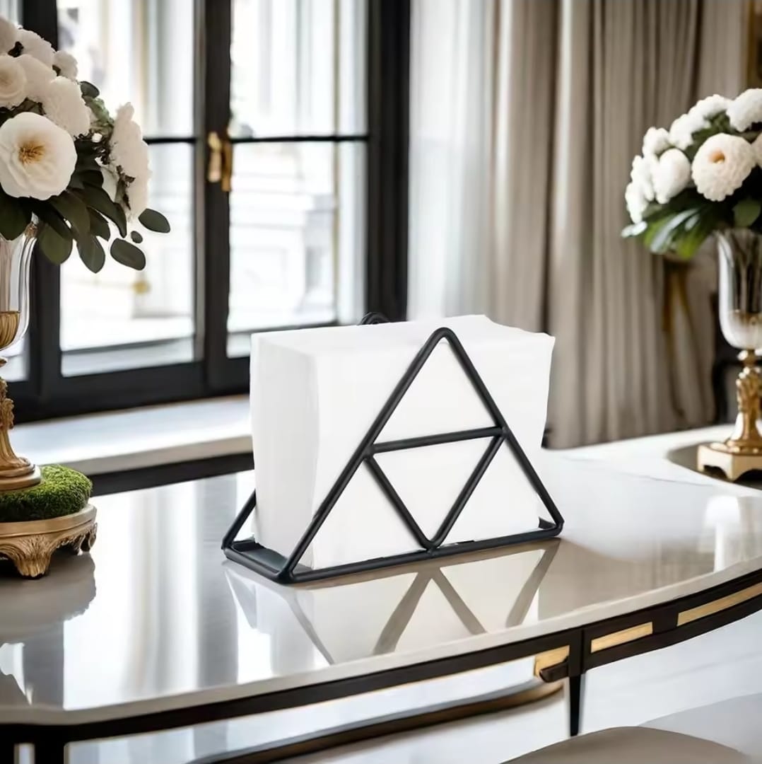 Modern metallic napkin holder in black and rose gold, stylish kitchen table accessory. 🍽️