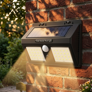 Solar power motion sensor wall light with wide angle illumination and waterproof outdoor security lighting