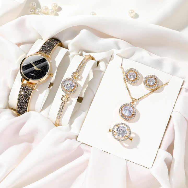 5-Piece Ladies gift set with watch, bracelet, necklace, ring, and earrings.