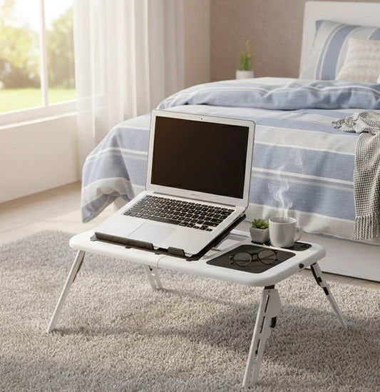 Foldable plastic laptop stand for ergonomic and portable use.