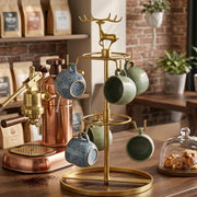 Six slot gold metal cup holder for organized and elegant cup storage