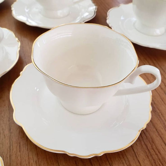 European-style tea set with six cups and six matching saucers.