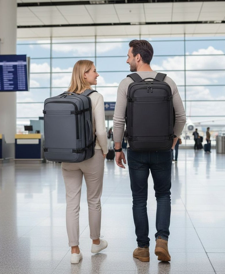 Expandable travel backpack in grey and black, slim to spacious design 46 by 32 by 22 to 28 cm for work, school, and travel.