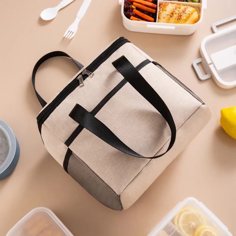 Large insulated lunch bag with adjustable shoulder strap and leakproof interior.