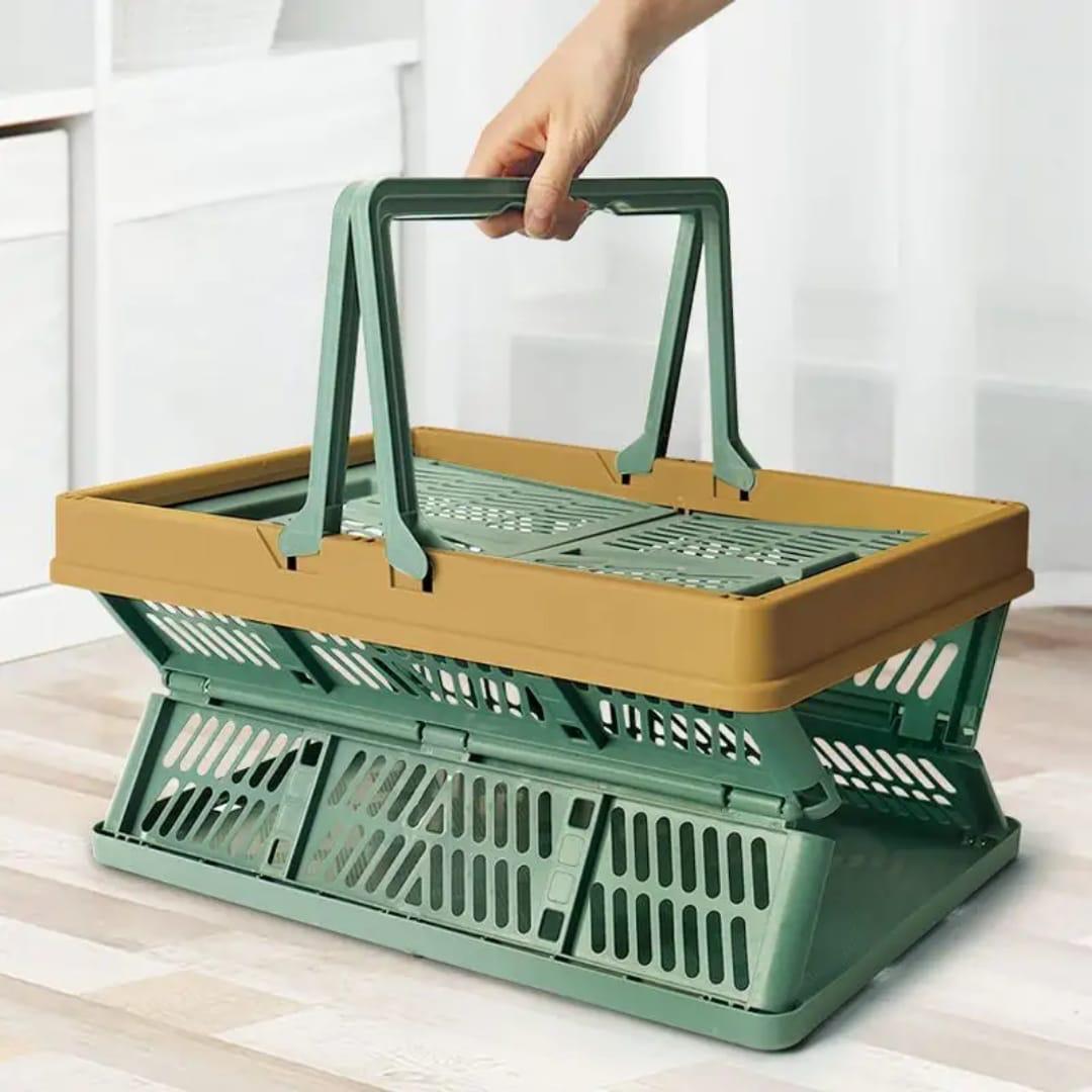 Large foldable collapsible stackable basket with handles in green,cream white and grey.