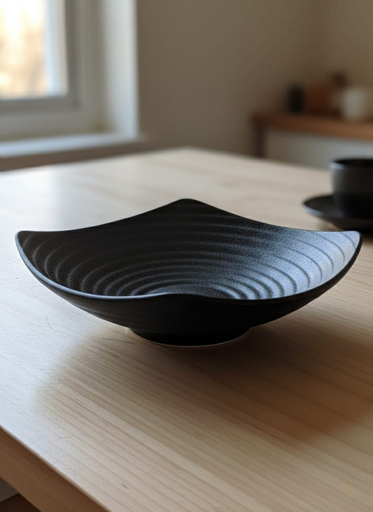 8-inch Black stoneware sizzling bowl, heat-resistant and durable for serving hot dishes.