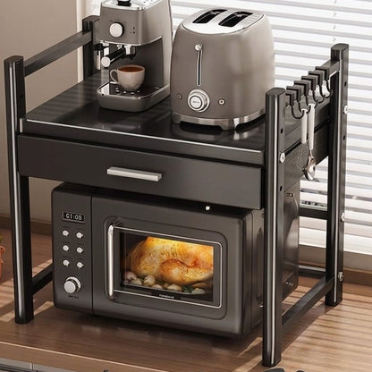 Heavy duty black microwave stand with extra storage drawer and rust-resistant carbon steel frame. 