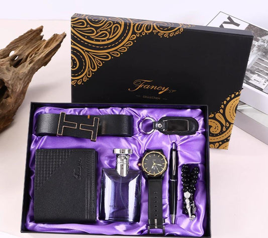 Seven-piece men’s gift set with belt, wallet, watch, perfume, key holder, pen, and bracelet in elegant packaging
