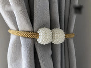 Pair of pearlescent magnetic curtain clips with thick pearl buckle for stylish curtain hold