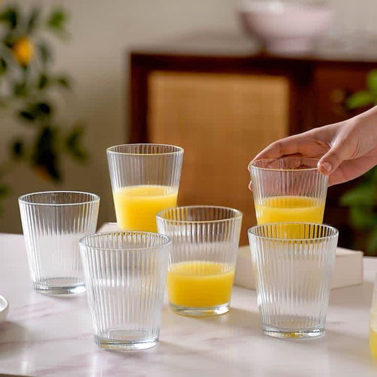 Short ribbed glass cup with a 300ml capacity made from clear glass