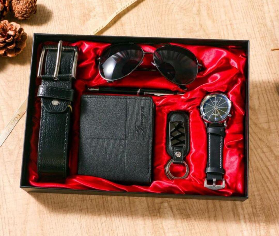 Men’s gift set with watch, wallet, belt, pen, keyholder, and sunglasses.