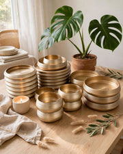 Gold and brown 24 piece hard glass dinner set with dinner plates, side plates, bowls, and soup bowls.