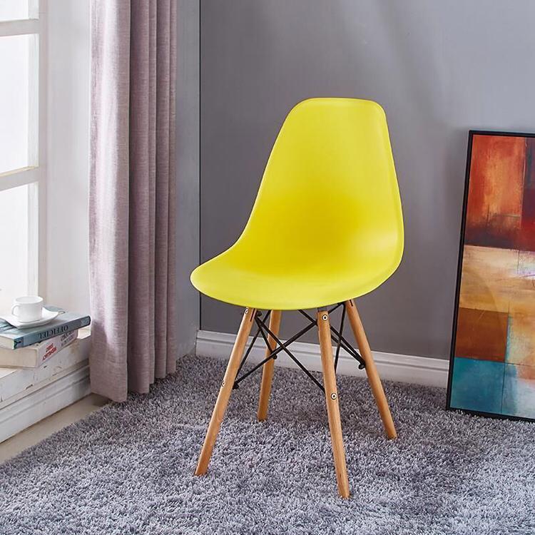 Eames-style comfortable chair available in yellow and orange