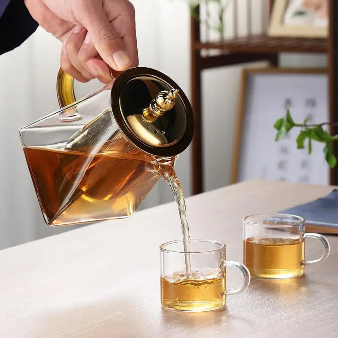 950ml heat resistant glass teapot with stainless steel infuser and square filter basket for tea brewing.