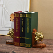 Set of 2 gold wolf-shaped bookends with detailed sculptural design