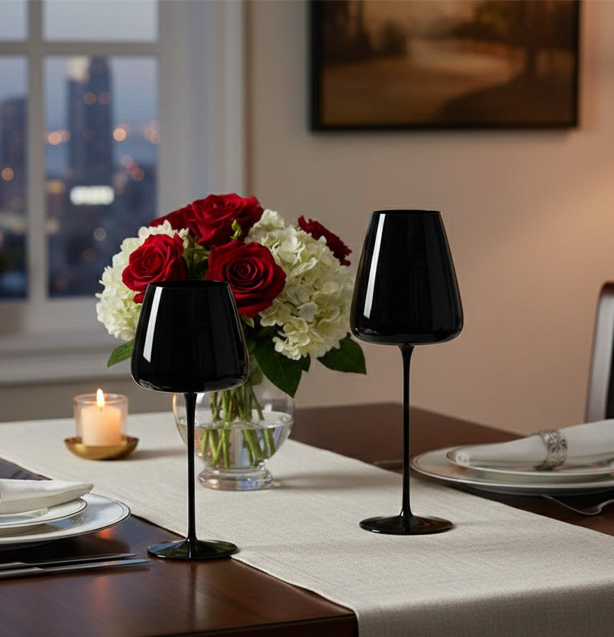 Pair of elegant long stem goblet wine glasses in black and gold with 620ml and 680ml capacities