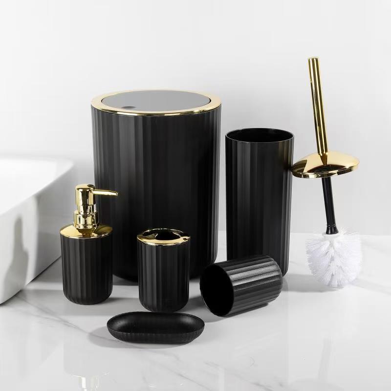 Luxury 6 piece round bathroom accessories set with gold and silver accents including trash can, soap dispenser, and toothbrush holders