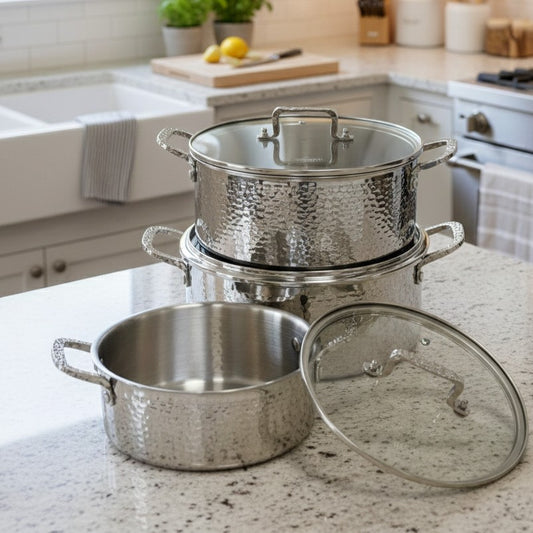 Triple stainless steel cookware set with hammered design and stainless steel lids in three casserole sizes
