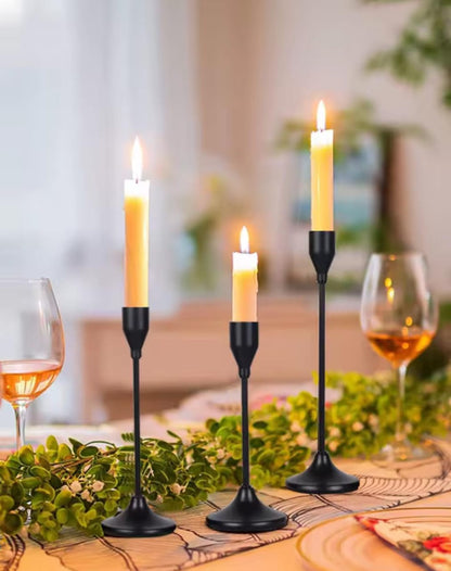 Black 3 in 1 metallic candle holder for home décor.