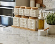 Luxury 8-piece ceramic canister set with ribbed design, bamboo lids, and tray, kitchen storage jars in 300 ml and 500 ml sizes.