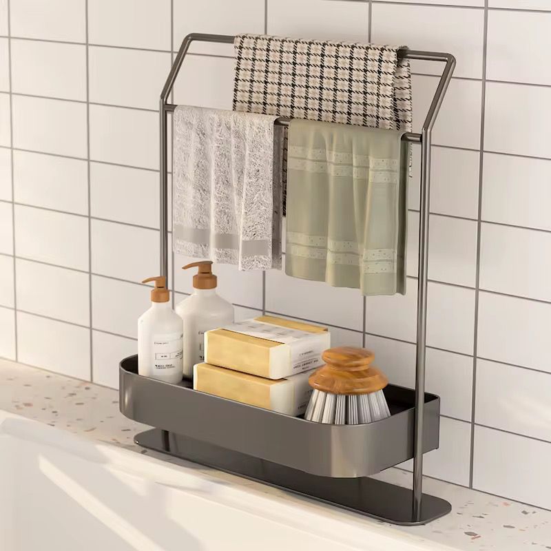 Grey and white sink organizer with compartments for sponges, brushes, and soap