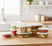 Seven piece food grade glass lunch box set with assorted sizes for meal storage and reheating.