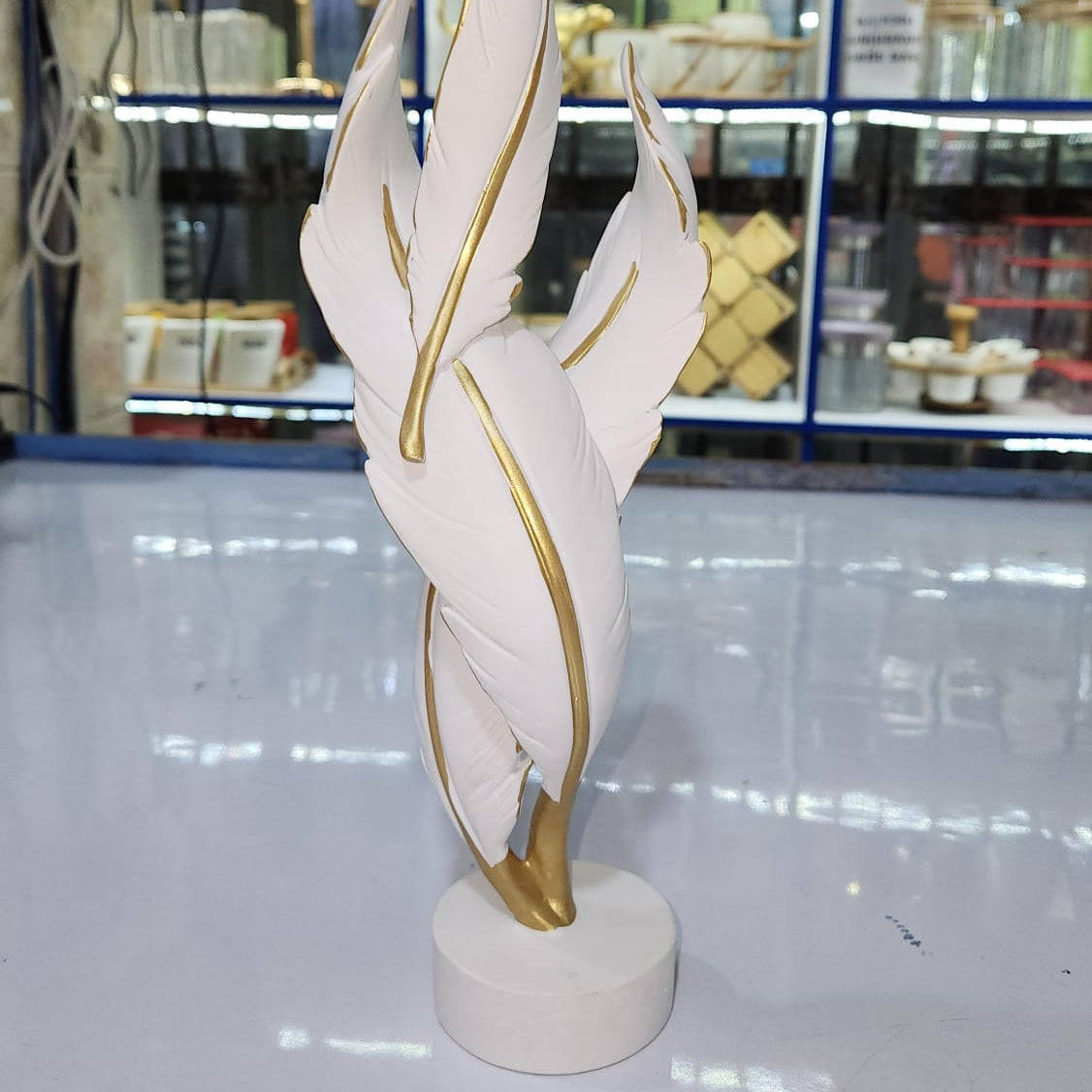 White and Gold Twisted Feather Resin Sculpture