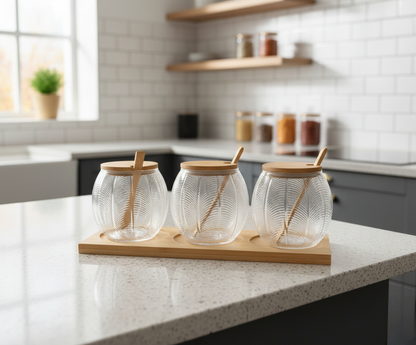 Set of three clear glass kitchen storage canisters