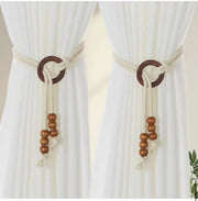 Pair of vintage natural wood curtain tiebacks with adjustable drawstring