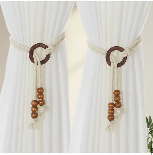 Pair of vintage natural wood curtain tiebacks with adjustable drawstring