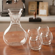 Round glass lemon decanter set with 4 glasses for serving juice, water, and cocktails in an elegant design