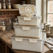 4-piece food grade fridge and freezer storage container set with multiple capacities for fresh food organization.