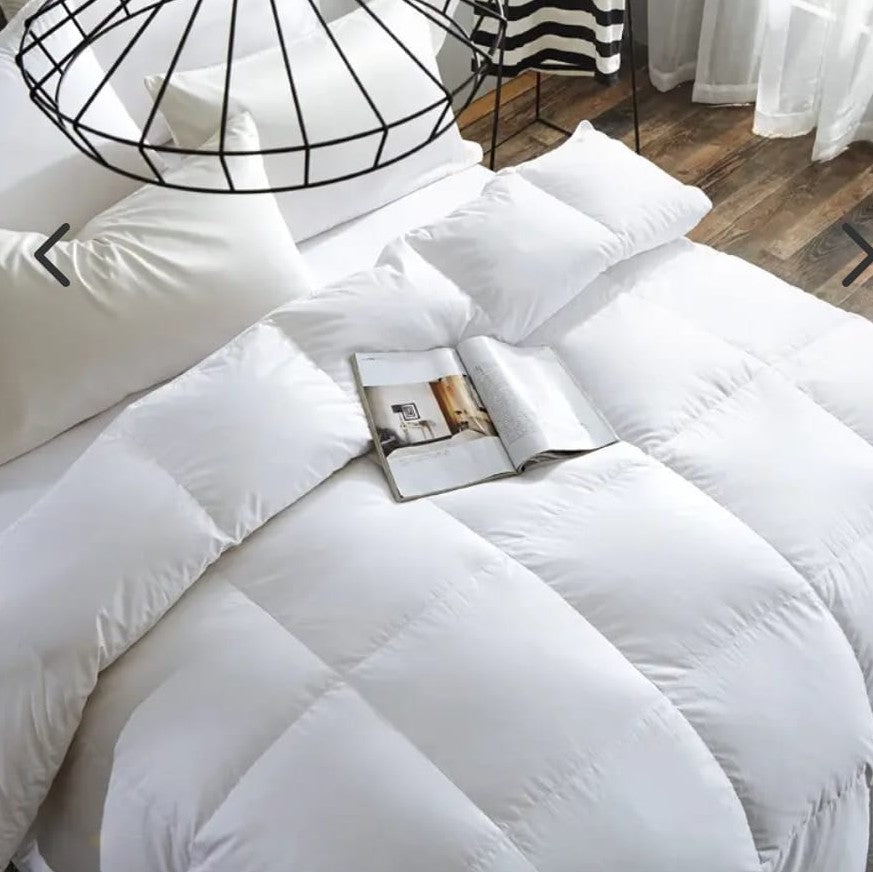 White 4 piece binded duvet set including one duvet, one bedsheet, and two pillowcases in 6 × 7 ft size