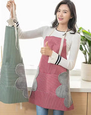 Waterproof kitchen apron with hand wipe pockets available in multiple colors.