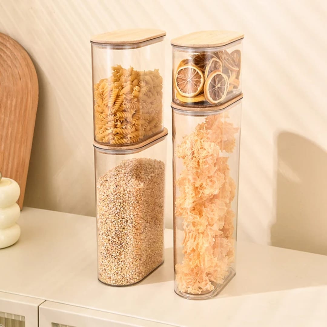 4pcs acrylic storage containers with bamboo lids, airtight kitchen jars in multiple sizes for pantry organization.