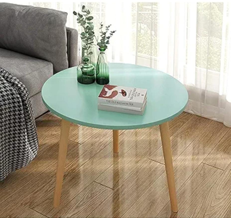 Round multifunctional side stool and table with natural wood legs, available in blue, yellow, and white.