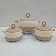 Three ceramic lidded pots with matching lids in a dusty pink and cream color scheme, accented with gold rope-style handles and loop lids, displayed on a light gray background.