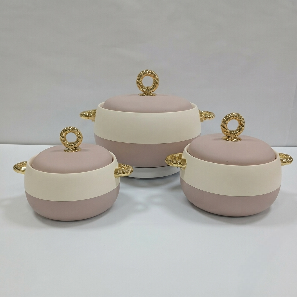 Three ceramic lidded pots with matching lids in a dusty pink and cream color scheme, accented with gold rope-style handles and loop lids, displayed on a light gray background.