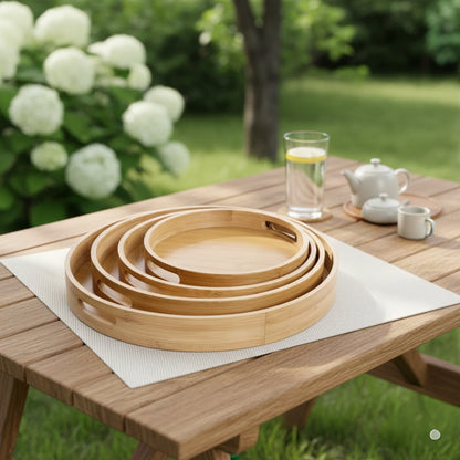 Set of four bamboo trays in different sizes.