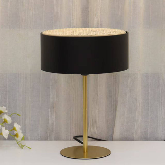 Modern gold table lamp with fabric shade available in white, cream, and black