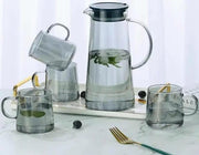 5-piece borosilicate glass set with 4 cups and 1 jug, heat-resistant and elegant