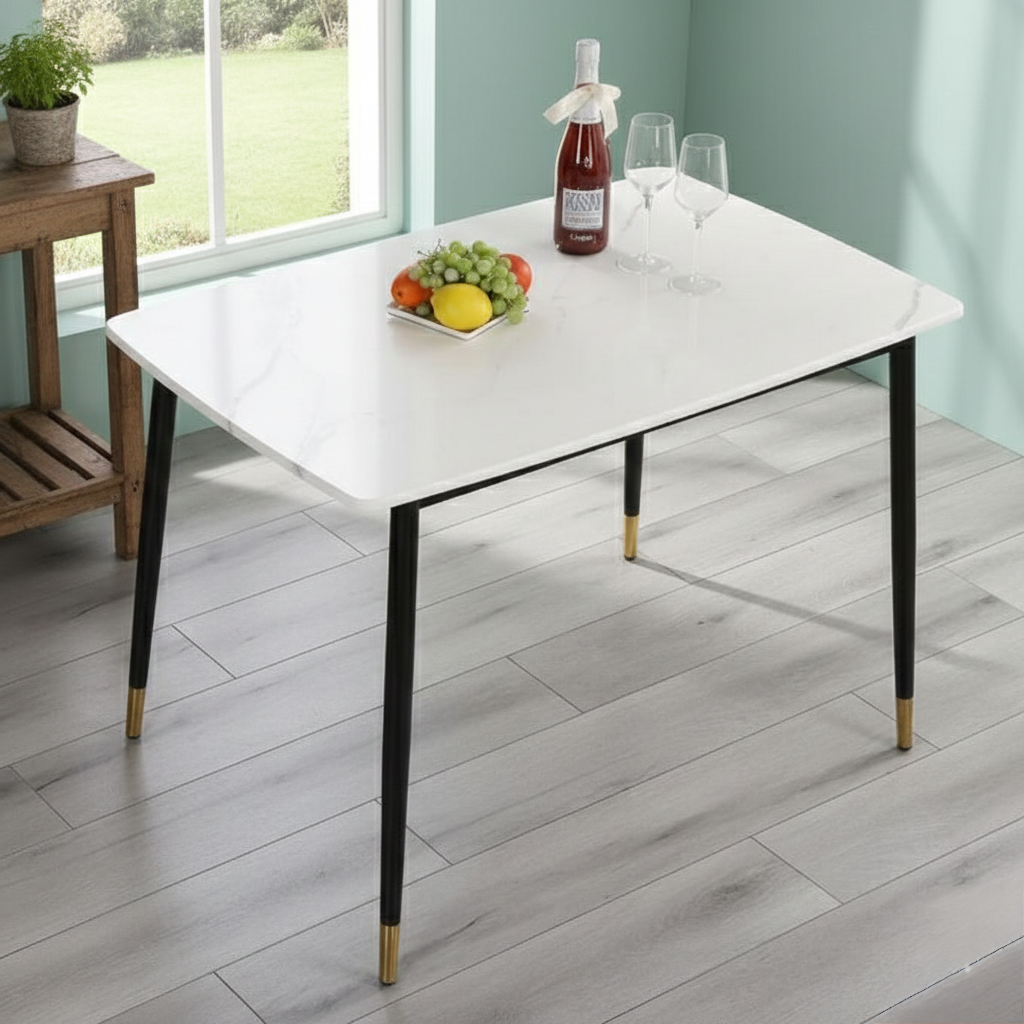 4-seater Marble dining table with metallic legs for modern dining spaces.