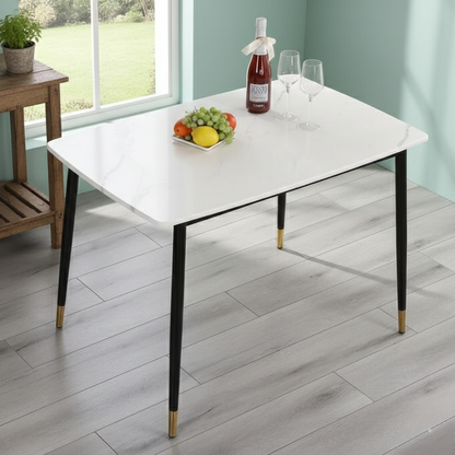 4-seater Marble dining table with metallic legs for modern dining spaces.