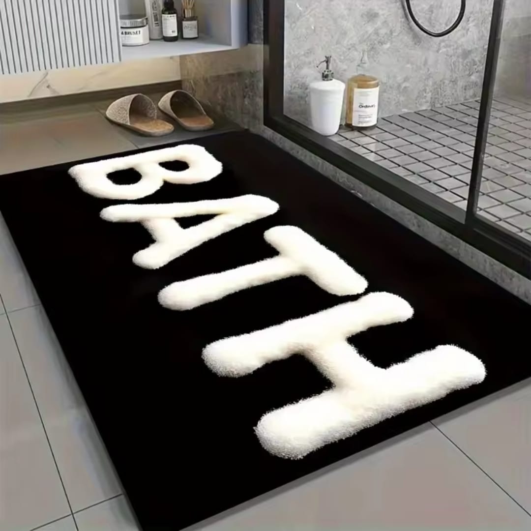 Black diatom bathroom mat measuring 50 × 80 cm with a highly absorbent surface and non slip rubber backing.