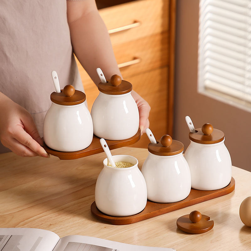 3 piece 480 ml ceramic canister set with bamboo base and scoop for organized kitchen and pantry storage.